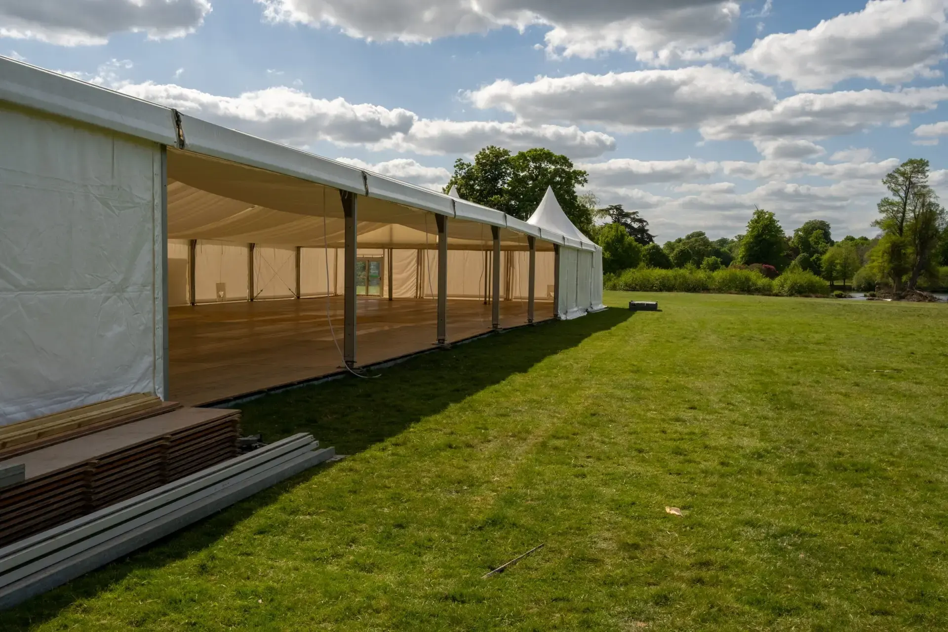 European-engineered PCS clear-span pavilion during installation with engineered timber flooring